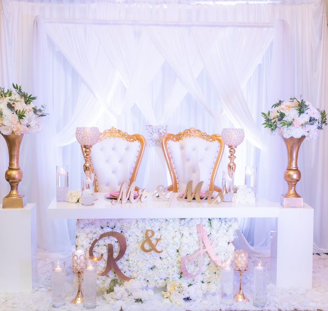 A couple of chairs sitting on top of a table.